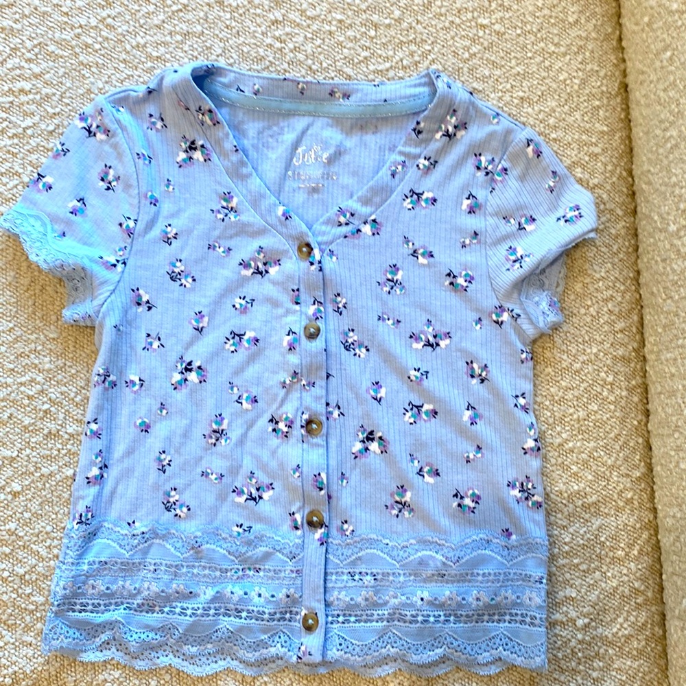 Justice soft top with lace sleeves and bottom. Blue with floral pattern for girl